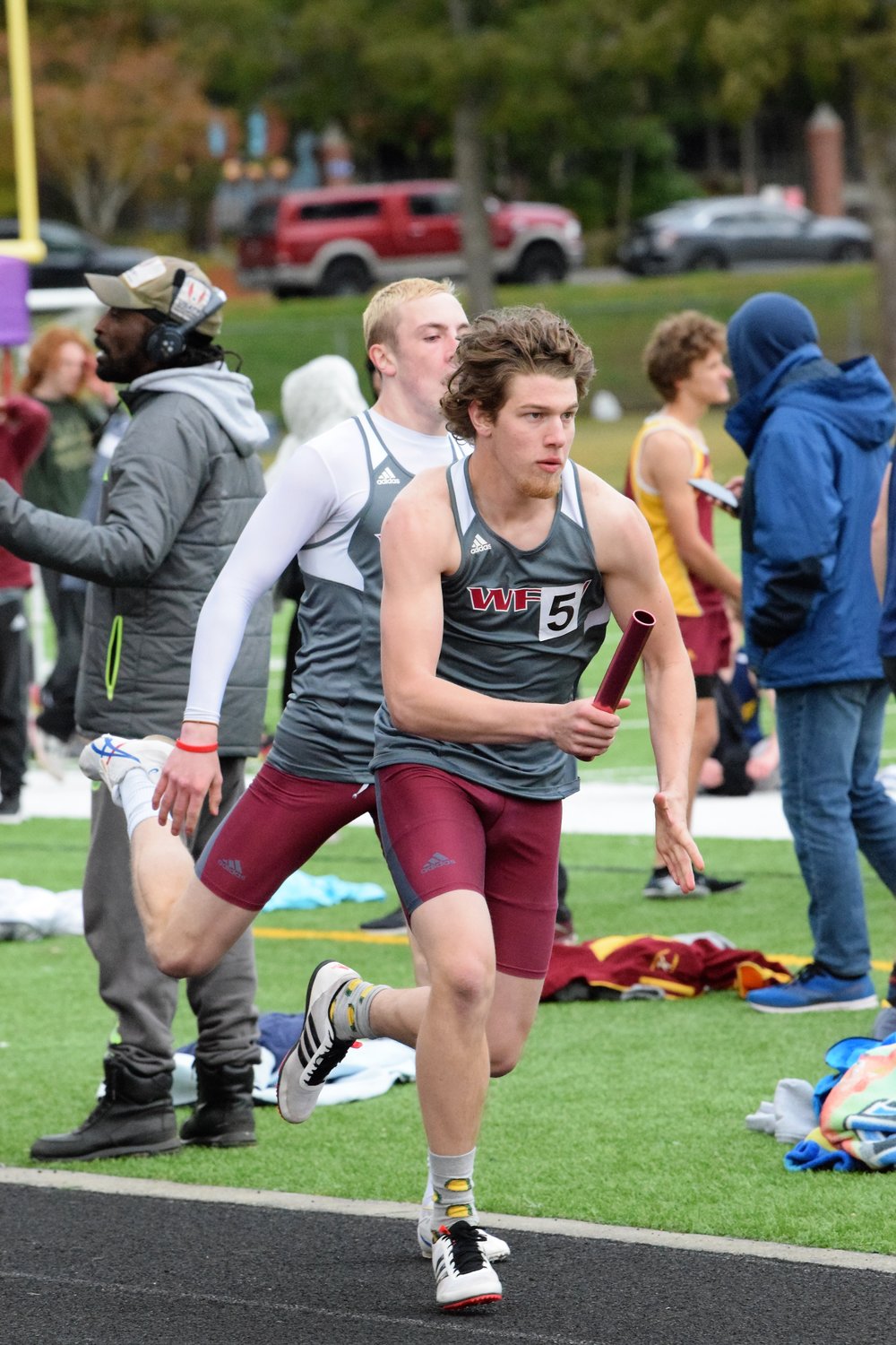 W.F. West's Charlie Mallonee runs in a relay at the Lil Norway Invite April 16.